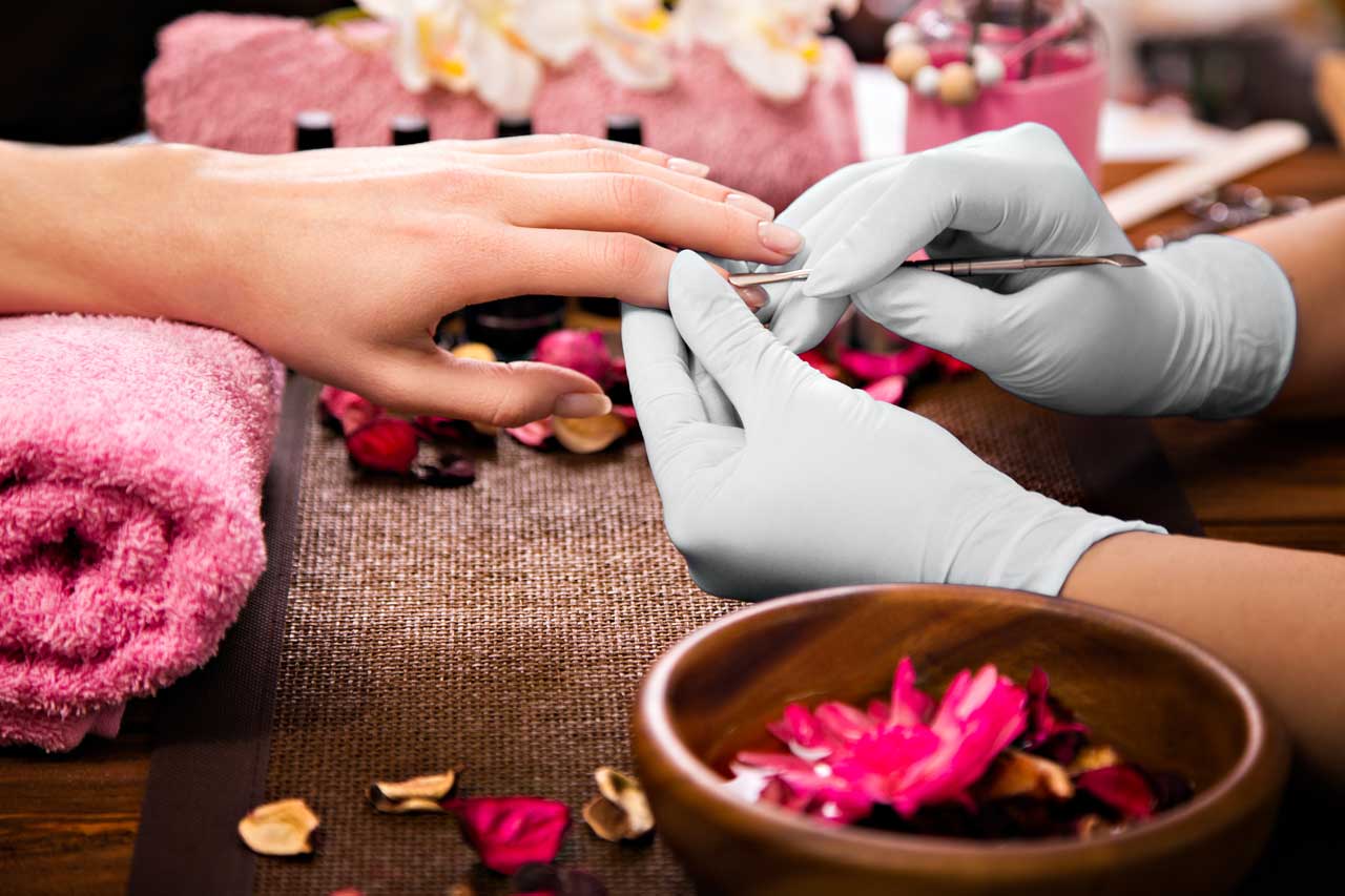 a person getting a manicure